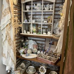 Antique pink and green porcelains and old lace collections
