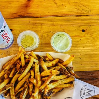 Moritz - a bowl of fries and a bottle of water - German Near Me - Brooklyn, New York Moritz - a bowl of fries and a bottle of water - German Near Me - Brooklyn, New York