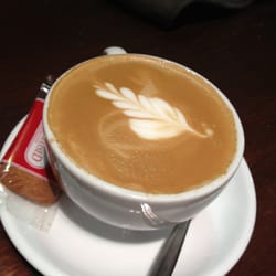 Di Bella Coffee - Complimentary flat white, caramelised biscuit