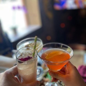 Last Drop Tavern - two cocktails in front of a tv - Bars Near Me - San Francisco, California Last Drop Tavern - two cocktails in front of a tv - Bars Near Me - San Francisco, California
