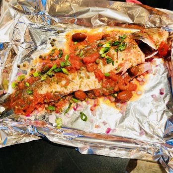 Tin Fish - Fish before the oven. Awesome service. Personally didn't like this style but that was just preference. Husband liked taste. - New American Near Me - Sunrise, Florida Tin Fish - Fish before the oven. Awesome service. Personally didn't like this style but that was just preference. Husband liked taste. - New American Near Me - Sunrise, Florida