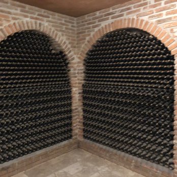 Baron Balche - Corridor with full bottles of wine - Wineries Near Me - Ensenada, BCN Baron Balche - Corridor with full bottles of wine - Wineries Near Me - Ensenada, BCN