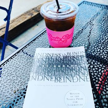 Uncle Beans Coffee - Peach tea in the background. - Coffee & Tea Near Me - Houston, Texas