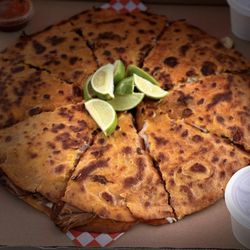 The Birria Munchies Truck - Birria "pizza" (two 14" flour tortillas filled with birria and cheese) $25 + tax and 2.6% cc fee (7/2024)