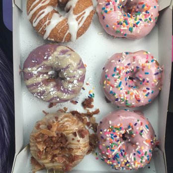 Duck Donuts - Strawberry glaze with rainbow sprinkles, cinnamon sugar with vanilla drizzle, blueberry pancake, maple bacon with salted caramel drizzle - Donuts Near Me - Greensboro, North Carolina