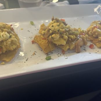 Aura Lounge - Ackee and Salt fish on tostones - Seafood Near Me - Hollywood, Florida