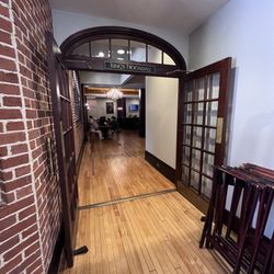 South County Brewing - Entry to the back room - "Kings Hideaway" - which has its own small bar and TVs.