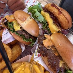 Onion rings!! Cheese fries, #1, single with the works and #8 bbq bacon with works. Onion rings!! Cheese fries, #1, single with the works and #8 bbq bacon with works.