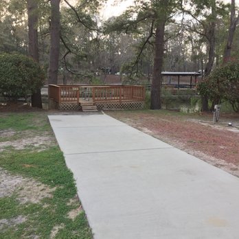 Myrtle Beach KOA - Empty site with private deck in back - Campgrounds Near Me - Myrtle Beach, South Carolina