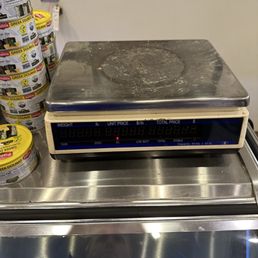 Food scale, this place is extremely dirty. Look at that scale that was like that at 6 AM this morning. It looks like it hasn't been cleaned