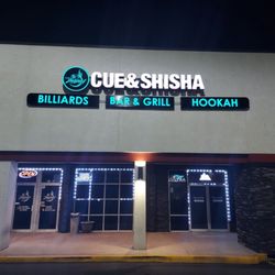 Cue & Shisha - Current photo of remodeled building facing and updated signage..