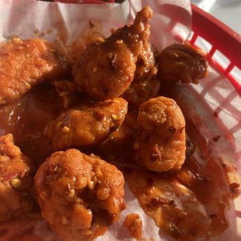 Rockhouse On The River - What's left of 25 hot boneless wings. These are soooooo good! Great tasting sauce! Makes ya sweat but not so hot you are miserable. - Pizza Near Me - Henderson, Kentucky
