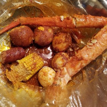 The Juicy Crab - Duluth - What's left of my King Crab order. I also paid for 3 potatoes and got 6 free. I added my own egg too. This is whats left. You get 2 claws. - Seafood Near Me - Duluth, Georgia
