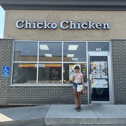MY daughter in front of the restaurant