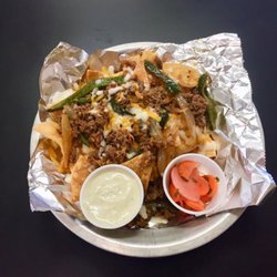 Rustica's A Globally Inspired Kitchen - Weekly special Fajita Nachos!!