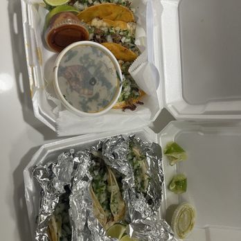 Taqueria Yanet - a container of tacos and a bowl of sauce - Food Trucks Near Me - Charlotte, North Carolina
