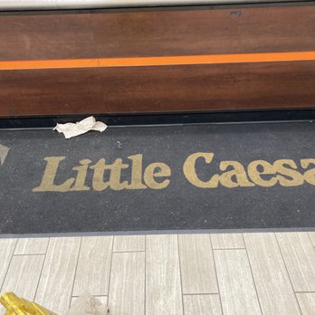 Little Caesars Pizza - a sign on the floor - Pizza Near Me - Kannapolis, North Carolina Little Caesars Pizza - a sign on the floor - Pizza Near Me - Kannapolis, North Carolina