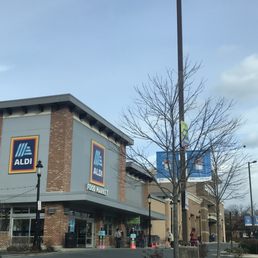 a view of a shopping center from the street
