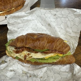 Bonne Chance Cafe - Avocado breakfast sandwich with bacon on a croissant - Salad Near Me - Boston, Massachusetts Bonne Chance Cafe - Avocado breakfast sandwich with bacon on a croissant - Salad Near Me - Boston, Massachusetts