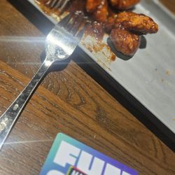 Main Event Grand Rapids - Very saucy boneless honey BBQ wings with ranch and fries, but they were so good! Good portions for the price!