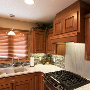 Spacemakers Remodeling - a kitchen with a stove and sink - General Contractors Near Me - Woodbury, Minnesota Spacemakers Remodeling - a kitchen with a stove and sink - General Contractors Near Me - Woodbury, Minnesota
