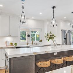KabCo Kitchens - Rich chocolate-brown island takes center stage -- complemented by quartz counters