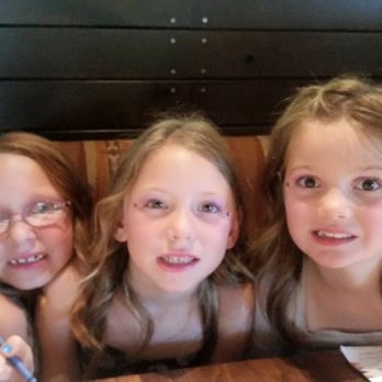 SPArkle Parties - The girls at dinner after hair, make up and nails - Party & Event Planning Near Me