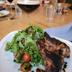 Sofia's Kitchen Bar - Spice Rubbed Charred Chicken Thighs - boneless thighs, arugula, cherry tomatoes, roasted peppers, pickled red onions, balsamic