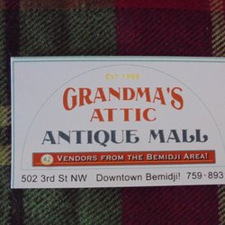 Grandma's Attic Antiques Collectibles & Crafts - Business card with contact info.