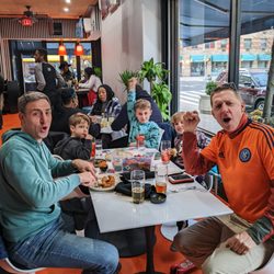 The Fox Harlem - Family enjoying a soccer game at The Fox. Go NYCFC!