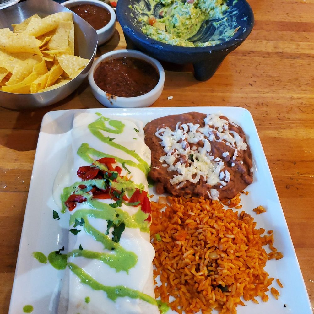 Cantina Laredo - Chicken fajita burrito and a tableside guacamole - Mexican Near Me - Jacksonville, Florida Cantina Laredo - Chicken fajita burrito and a tableside guacamole - Mexican Near Me - Jacksonville, Florida
