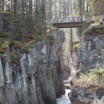 Jasper National Park - Bridge over a narrow  canyon at Athabasca Falls - Parks Near Me