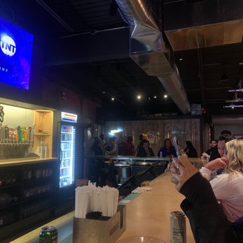 Crown & Common - a bar with people sitting at the bar - Chicken Wings Near Me - Green Bay, Wisconsin Crown & Common - a bar with people sitting at the bar - Chicken Wings Near Me - Green Bay, Wisconsin