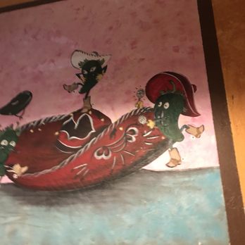 Casa Mexico - a painting of a woman riding a shoe - Mexican Near Me - Eagle, Idaho
