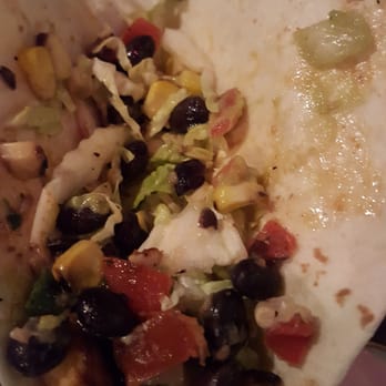 Longfellow Grill - down toward the bottom of my fish taco, you can see all the other goodness hidden by the heaping mounds of fish! - American Near Me - Minneapolis, Minnesota Longfellow Grill - down toward the bottom of my fish taco, you can see all the other goodness hidden by the heaping mounds of fish! - American Near Me - Minneapolis, Minnesota