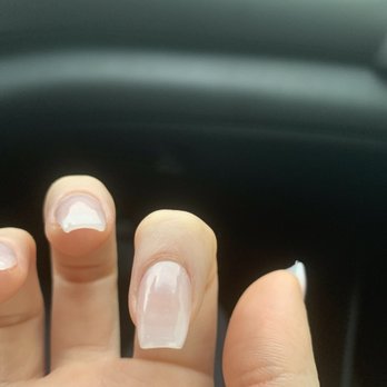 Resort Nails and Spa - The color of the bottom pointer nail isn't even - Nail Salons Near Me - Coppell, Texas Resort Nails and Spa - The color of the bottom pointer nail isn't even - Nail Salons Near Me - Coppell, Texas