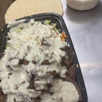 Laila Turkish Grill - Beef and lamb rice bowl with white sauce, and a side of hummus. - Falafel Near Me Laila Turkish Grill - Beef and lamb rice bowl with white sauce, and a side of hummus. - Falafel Near Me