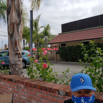 Coral Cafe - We got these beautiful flowers next to us - American Near Me - Burbank, California Coral Cafe - We got these beautiful flowers next to us - American Near Me - Burbank, California