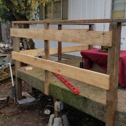 Get R Dunn Home Repair And Maintenance - New hand rails being installed with new upright piers.