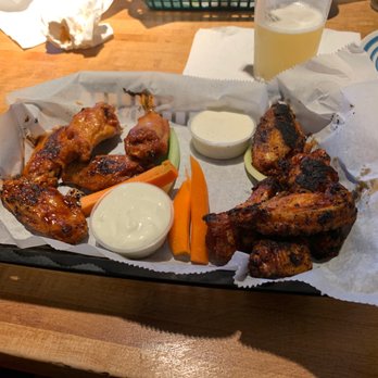 Moosehead Grill - 1/2 uncle dons famous blackened wings. 1/2 Bee stings (honey habanero) - American Near Me - Charlotte, North Carolina