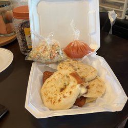 Pupuseria San Salvador - Queso, bean and meat along with salsa and cabbage slaw