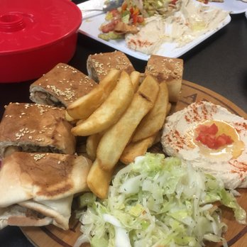 Me'Mo's Middle Eastern Cuisine - I can't remember the name.. "A... special sandwich" I think. You must try this!! And the baba ganush/hummus appetizer- I want more!! - Lebanese Near Me - Modesto, California