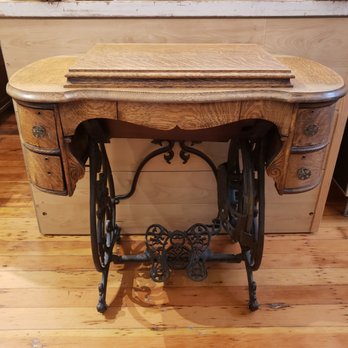 Passionate Feast - 100+ year old sewing machine with oak cabinet and elaborate cast iron base - Antiques Near Me - Crockett, California