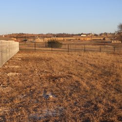 Berg Fence Construction - Good fencing makes good neighbors. Here is a 5 way neighboring fence area that we helped secure. Let us help you with your fencing needs.