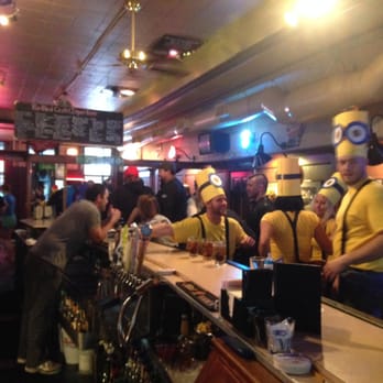 Jim's Place - a group of people sitting at a bar - Beer Bar Near Me - Appleton, Wisconsin