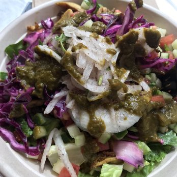 Naf Naf Grill - chicken schwarma salad with the milder green sauce (which had my mouth on ). this salad was SO good ! - Middle Eastern Near Me - Chicago, Illinois Naf Naf Grill - chicken schwarma salad with the milder green sauce (which had my mouth on ). this salad was SO good ! - Middle Eastern Near Me - Chicago, Illinois