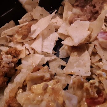 Taco Bell - A bunch of small broken pieces of chips hidden at the bottom. Ripoff! - Fast Food Near Me - Ontario, California