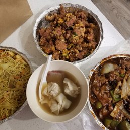 From top: Salt and Peppery Spareribs, Beef in Black Bean Sauce on Fried Rice Noodles, Wonton Soup, Singapore-style Noodles