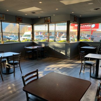 Bisla - empty tables and chairs in a restaurant - Indian Near Me - Squamish, British Columbia