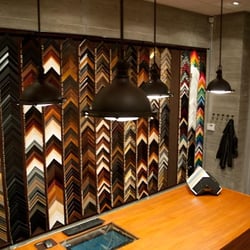 Our design table with hundreds of frame sample corners you can choose from.
